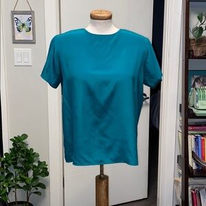Green silk blouse
